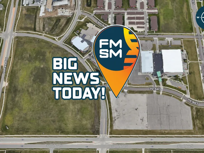 A google map aerial image over Scheels arena parking lot with text Big News Today and a google pin with the FMSM logo in the middle. The pin points to the intersection of Seter Pkwy and 31st Ave. S., the future location of FMSM.