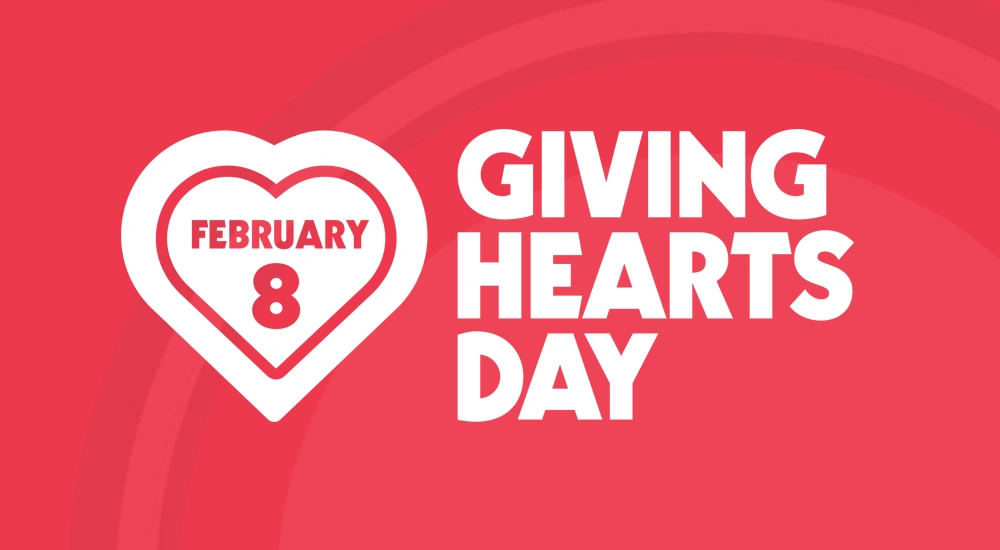 Giving Hearts Day, February 8th. Red heart with red text