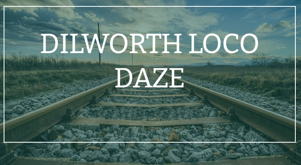 White text on a railroad track image reading Dilworth Loco Daze